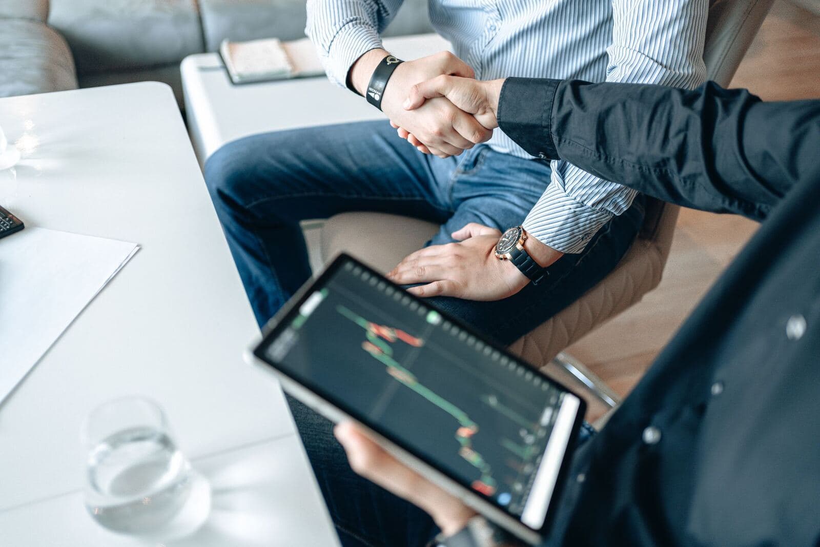Business partners collaborating around a meeting table