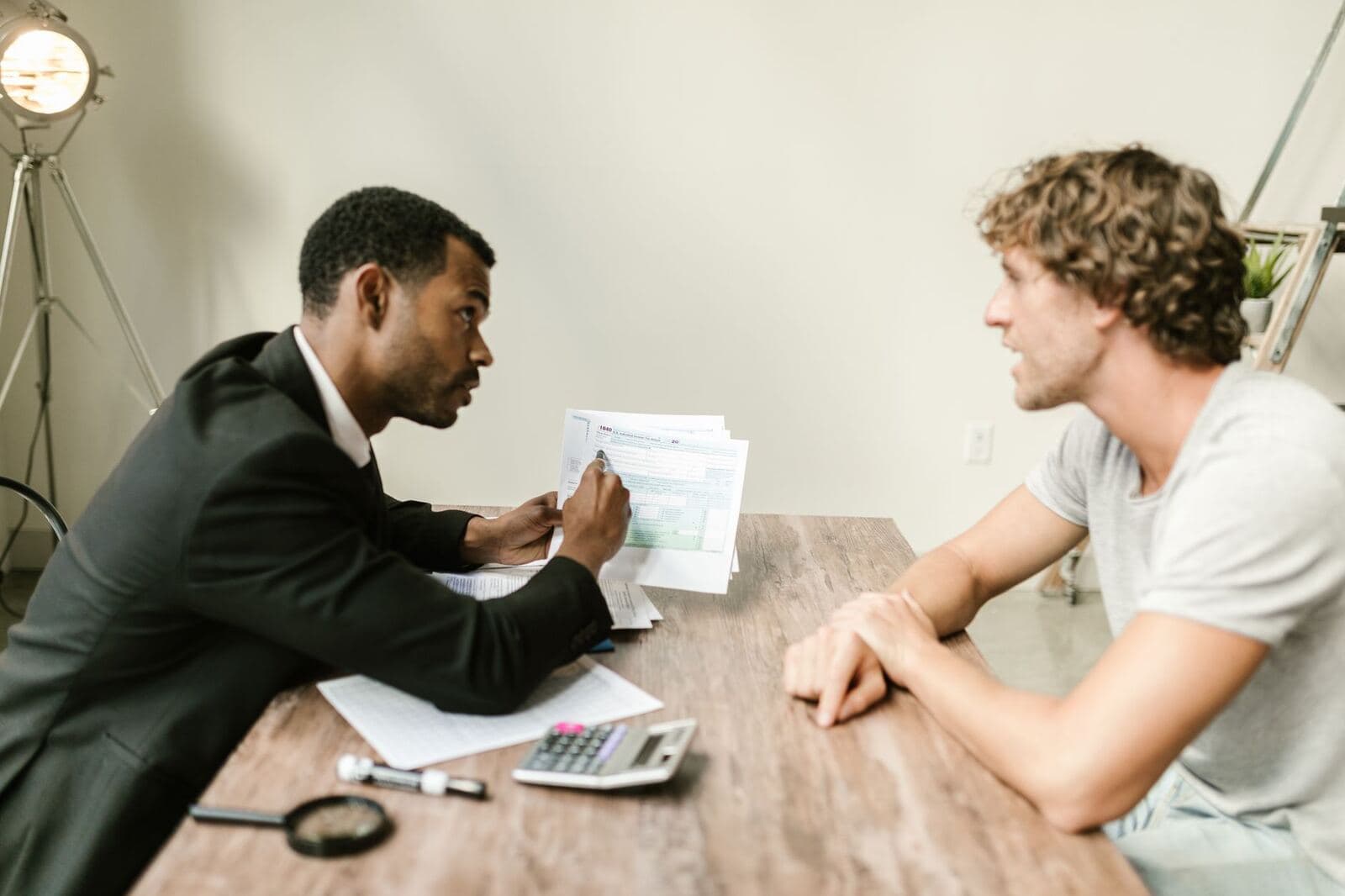Advisor going over finances and paperwork with a client